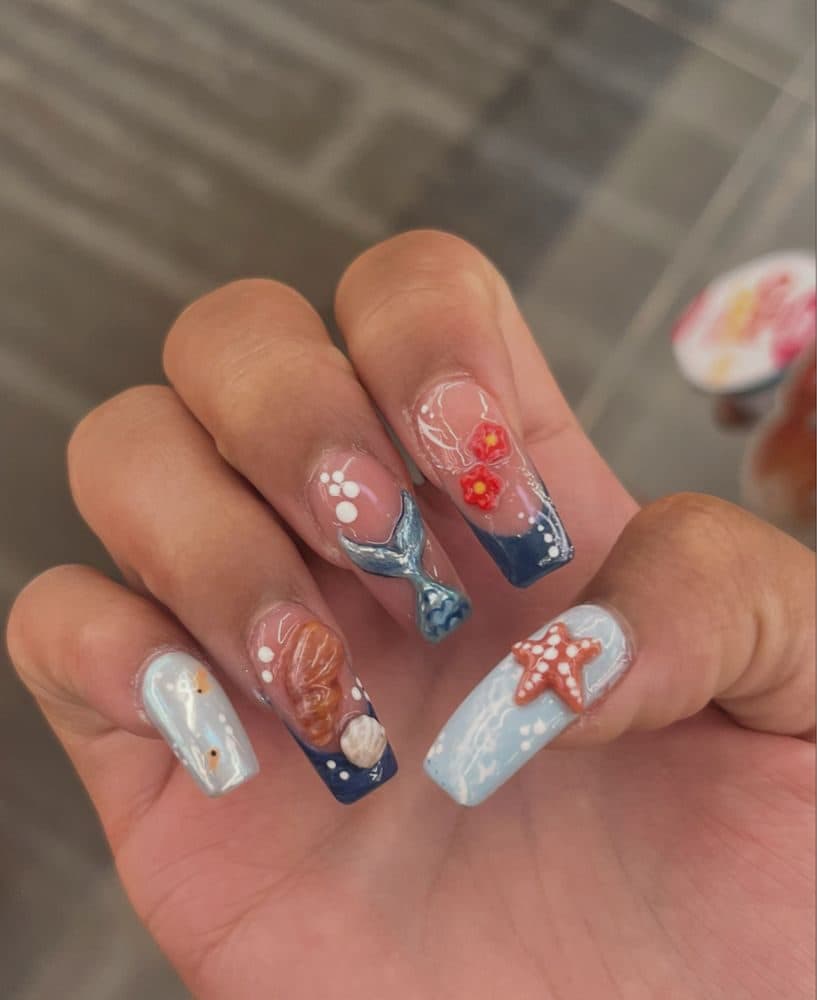 Long square nails with 3D mermaid tail, shell and starfish art in ocean blues